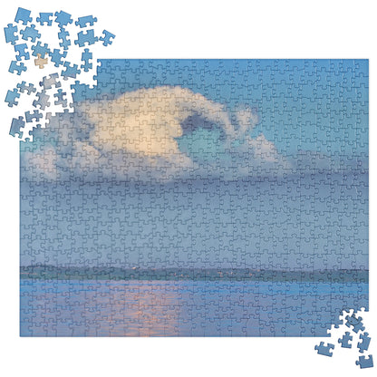 Your Suggested Brand Jigsaw puzzle with a completed section with illustration of a cloud over a lake.
